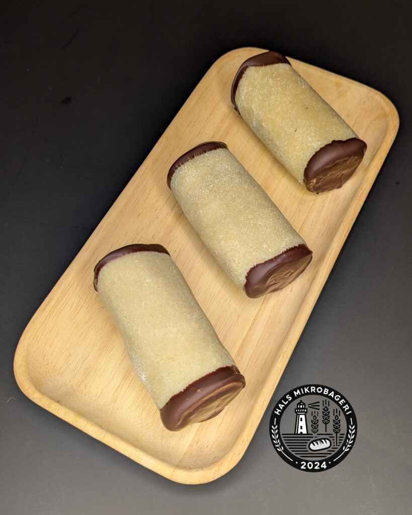 Træstammer. bestil brød i Hals